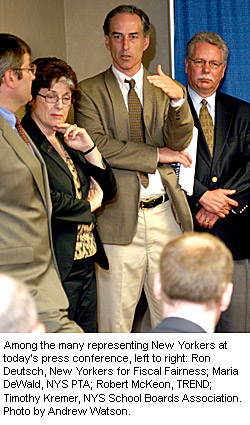 Among the many organizations representing New Yorkers at today's press conference, left to right: Ron Deutsch, New Yorkers for Fiscal Fairness; Maria DeWald, NYS PTA; Robert McKeon, TREND; Timothy Kremer, NYS School Boards Association. Photo by Andrew Watson.